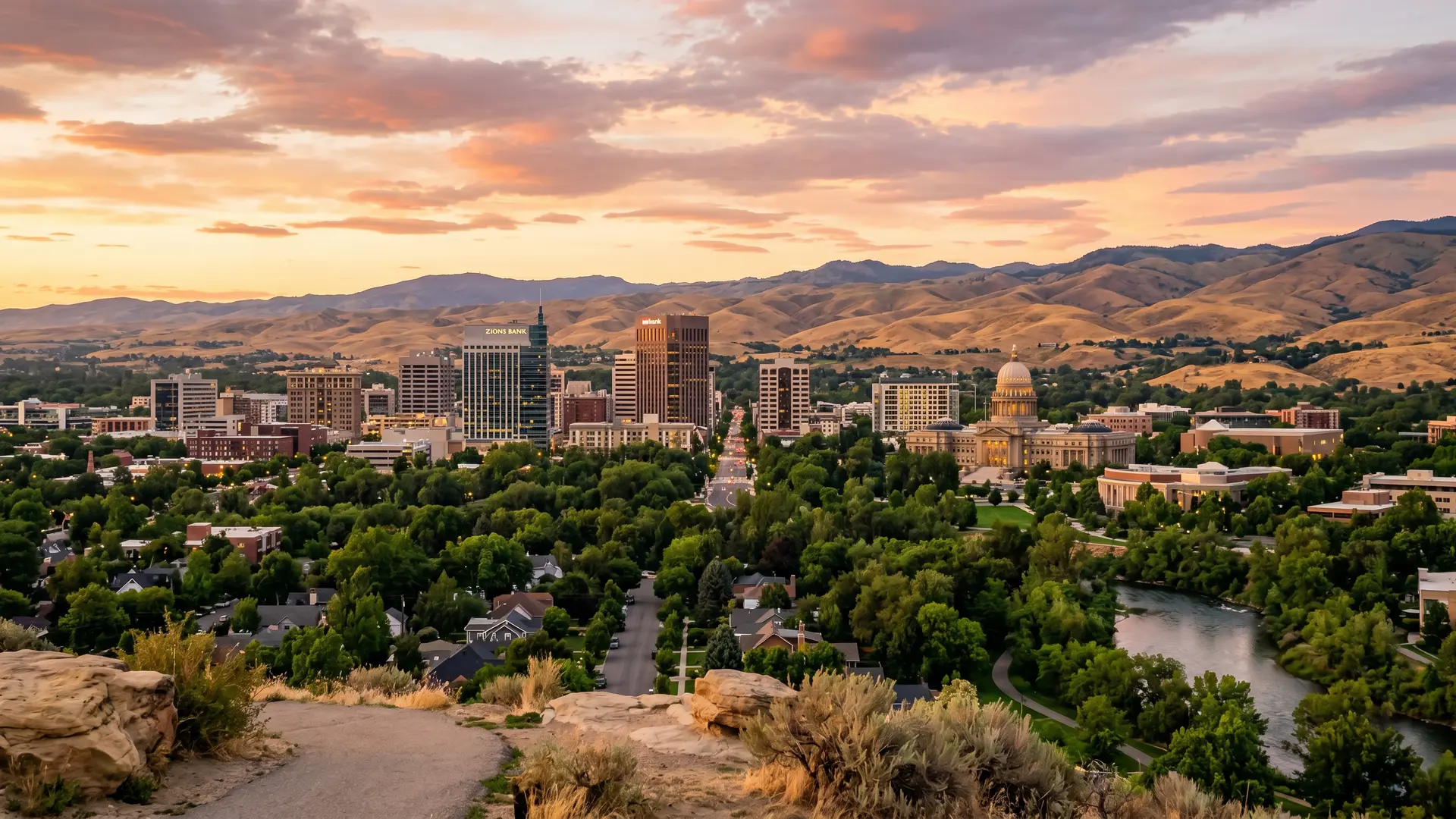 City skyline with a capitol dome, tree-lined streets and foothills, water damage restoration in Idaho and Eastern Washington