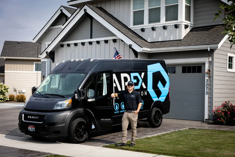 apex employee next to van